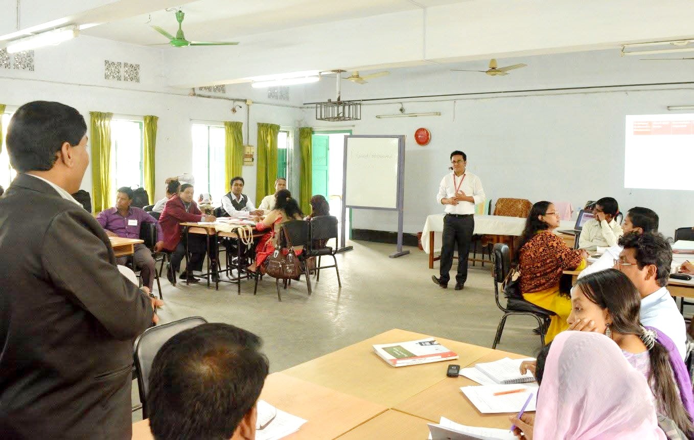 Teachers working in groups during an L4D training workshop